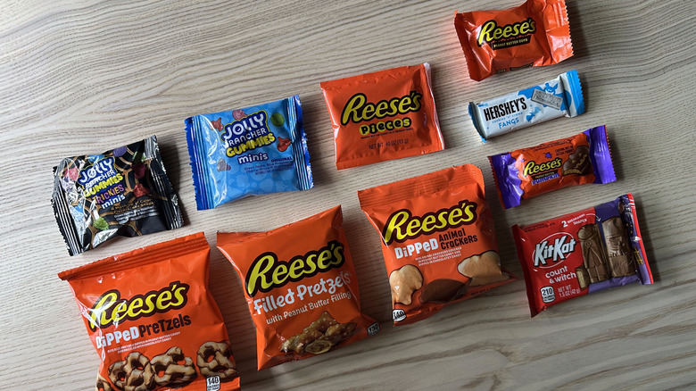 Reese's Halloween candy arranged on wooden table