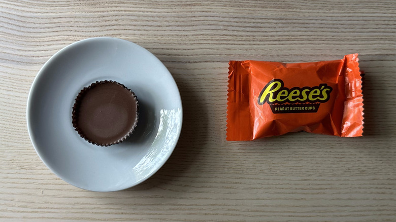 Reese's Peanut Butter Cup on wooden table