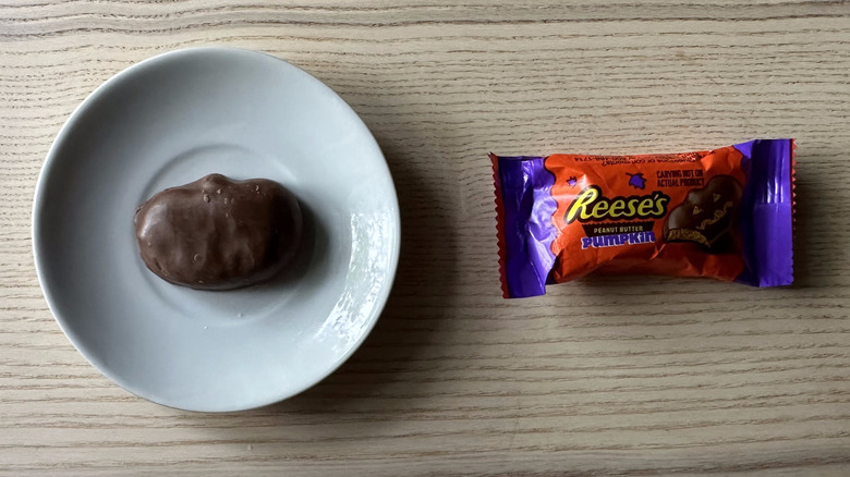 Reese's Milk Chocolate Peanut Butter Snack Sized Pumpkins on wooden table
