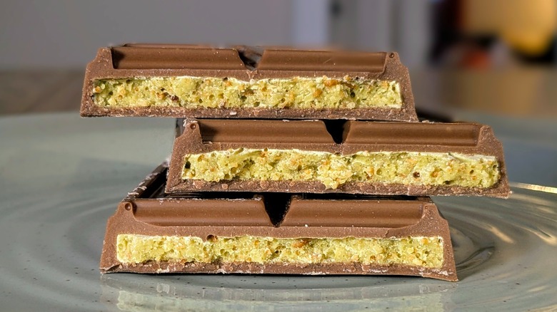 Close-up of Hershey's Dubai-Inspired Chocolate Bar pieces stacked on top of one another with the filling visible