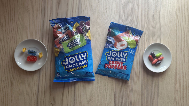 Bags of Jolly Ranchers on wooden table
