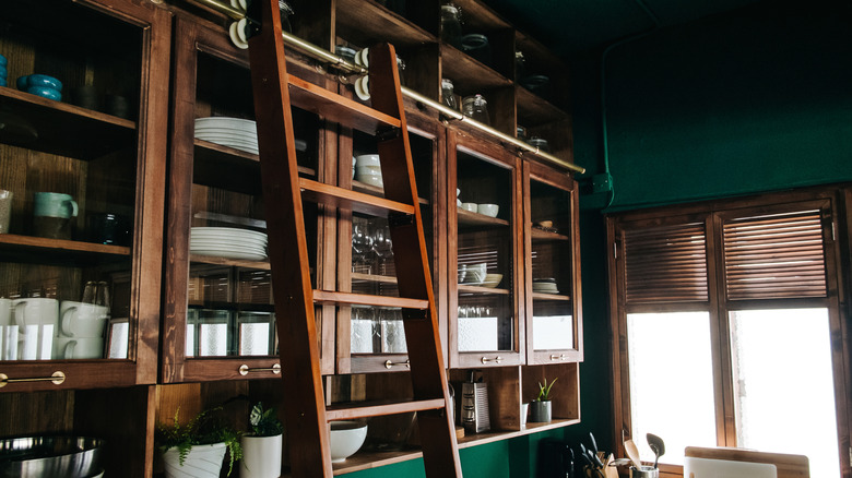 Rolling ladder in a wood kitchen