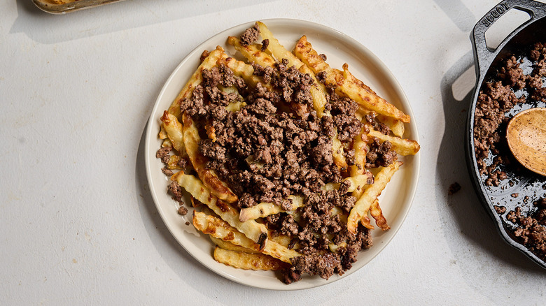 platter of fries topped with beef