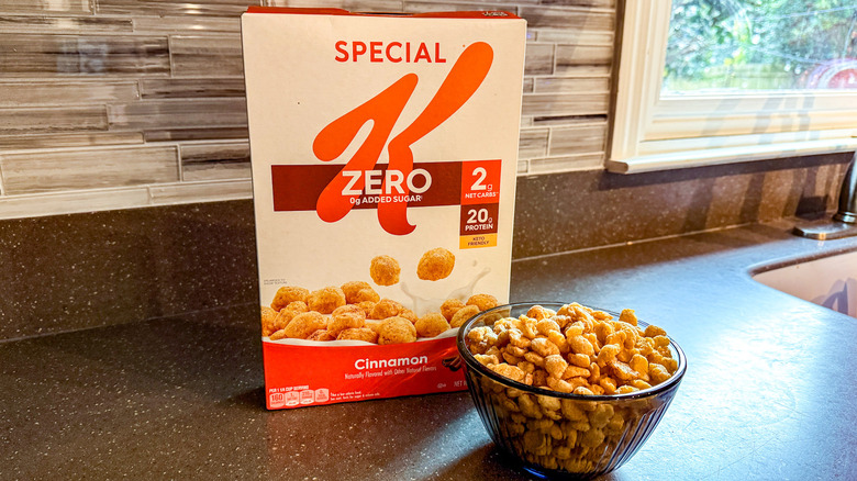 A box and bowl of Special K Zero Cinnamon protein cereal are shown.