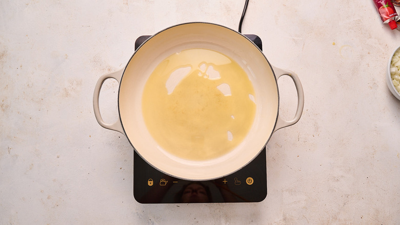 heating oil in a skillet