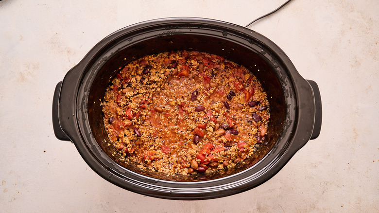 cooked chili in a slow cooker