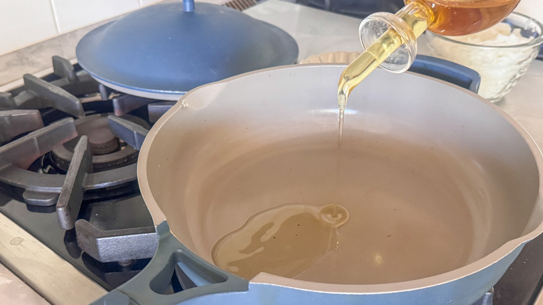Add oil to pan