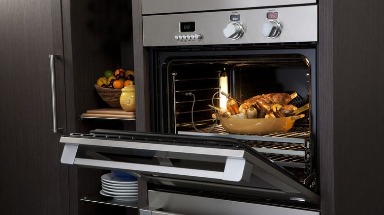 Open wall oven in kitchen
