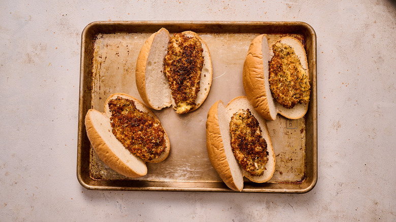 chicken cutlets inside of hoagie rolls