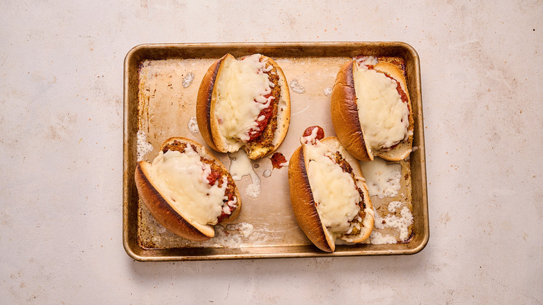 melted cheese on hoagie rolls