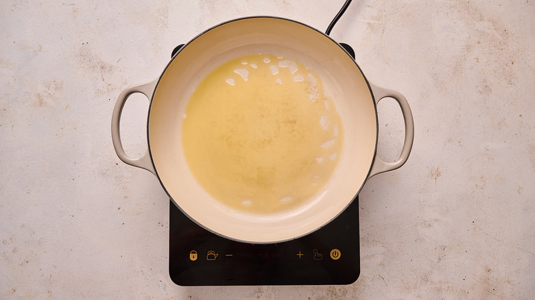 heating oil in a skillet