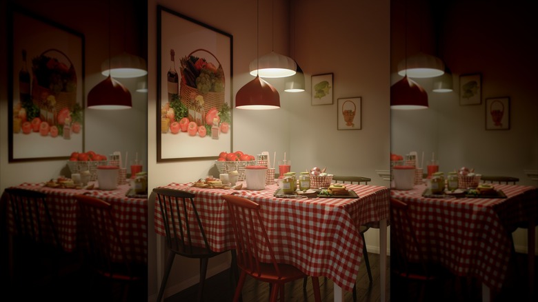 Kitchen table with gingham tablecloth and chairs, large fruit picture on wall, fruit and dishes on table