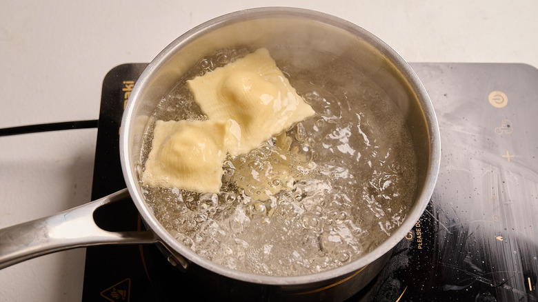 cooking ravioli in a pot