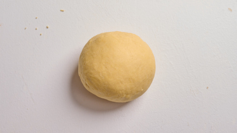 kneaded dough on a table