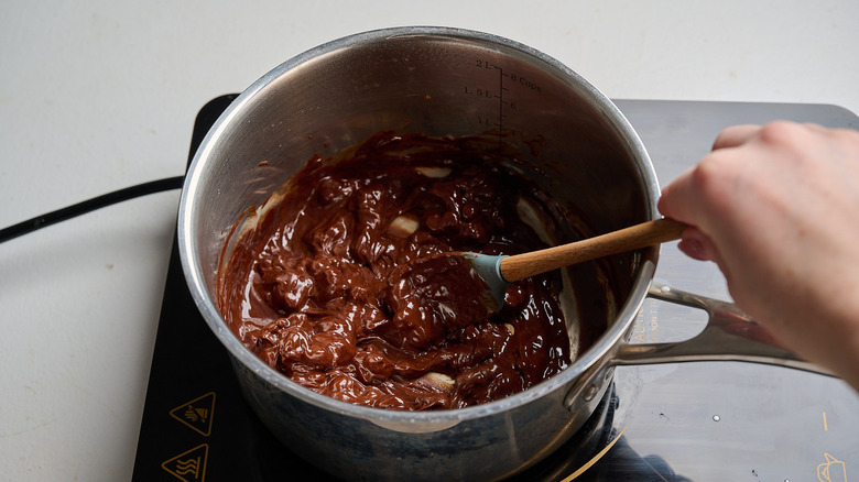 melting chocolate into a ganache