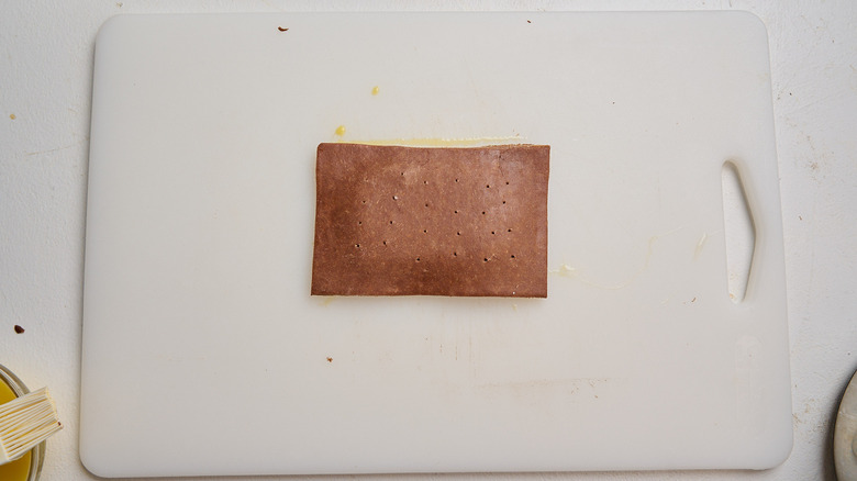 top of dough placed onto bottom of dough