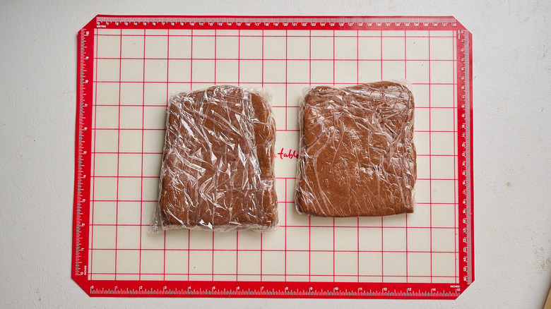dough formed into squares and wrapped in plastic