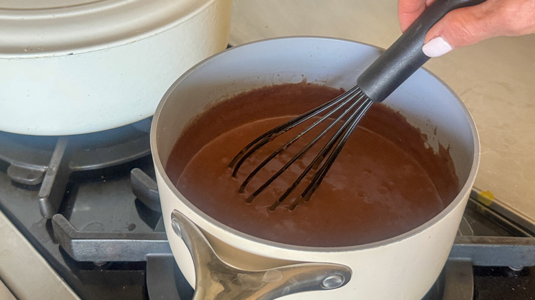 hand whisking chocolate mixture