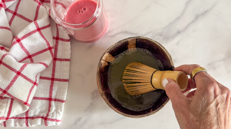 hand whisking matcha