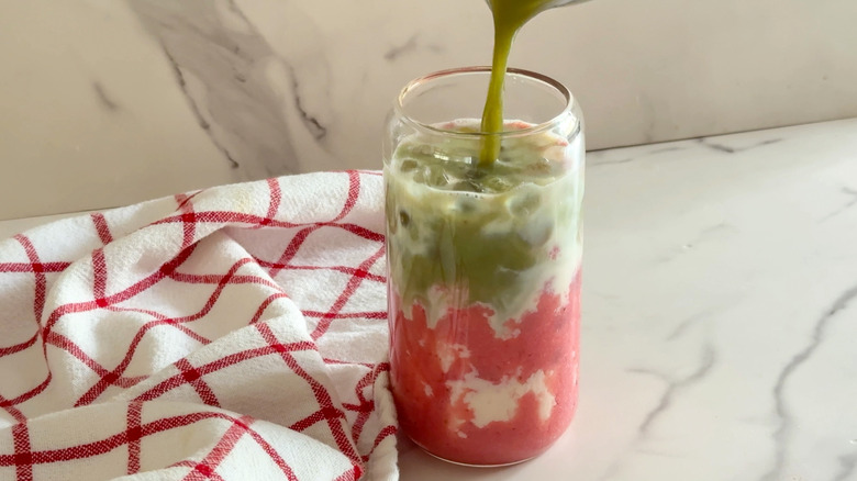 pouring matcha in glass