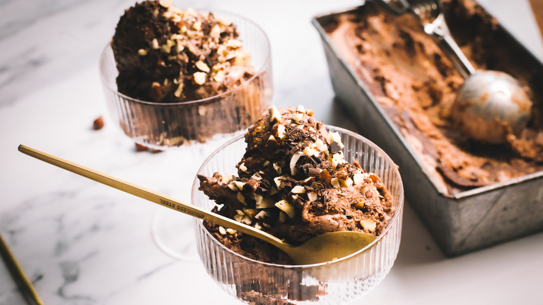 Two servings of Nutella ice cream in front of container