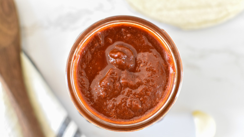 jar of red enchilada sauce