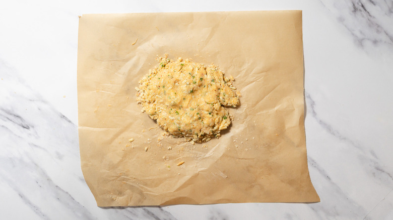 Cheese straws dough on parchment paper