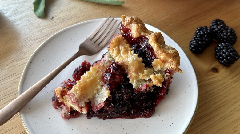 blackberry pie slice on plate