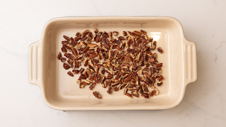 roasted pecans on baking tray