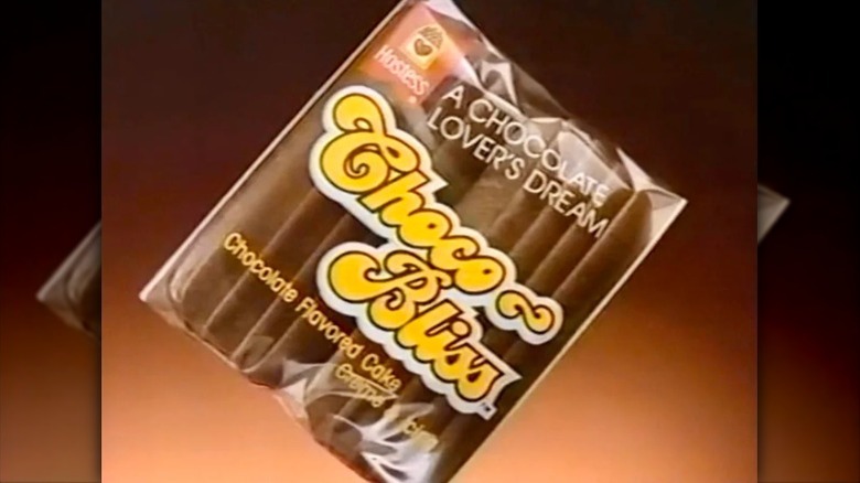 A package of Hostess Choco-Bliss chocolate flavored cake on a brown background.