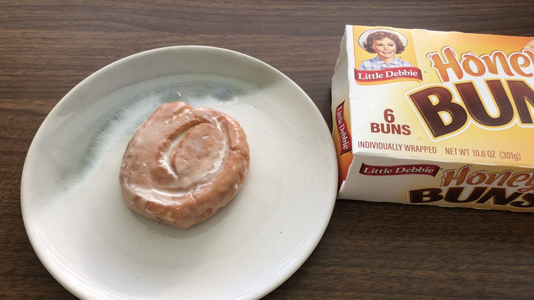 Little Debbie Honey Bun on a plate.