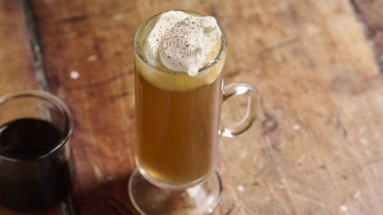 hot buttered whiskey in a glass on a table