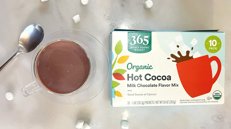 Mug of cocoa and package