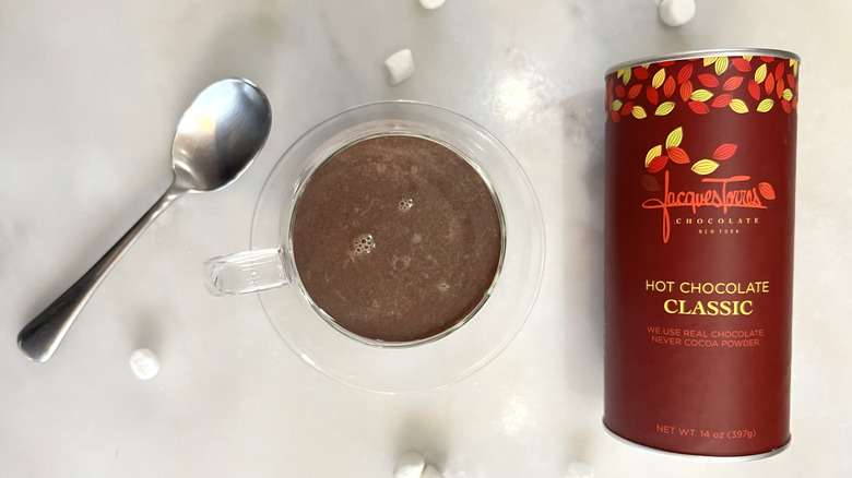 Mug of cocoa and package