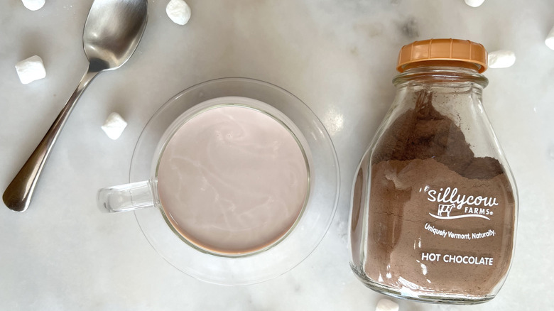 Mug of cocoa and package