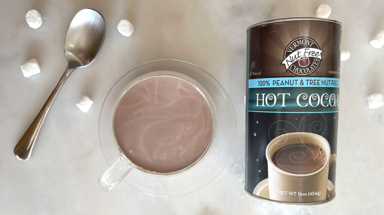 Mug of cocoa and package