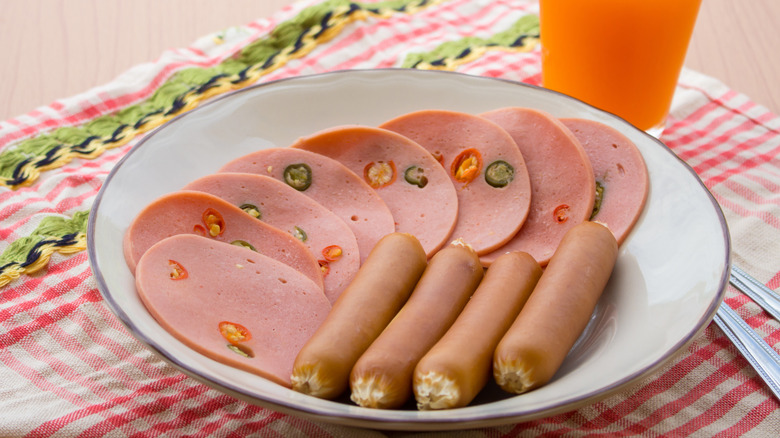 plate with hot dogs and bologna