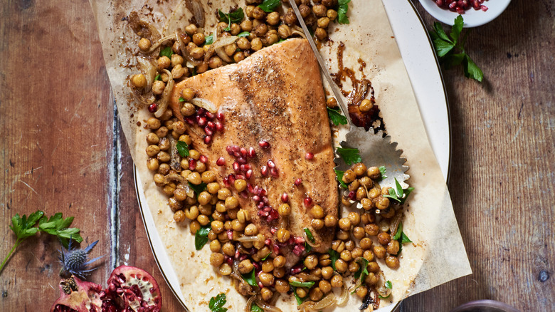 salmon on a platter with chickpeas