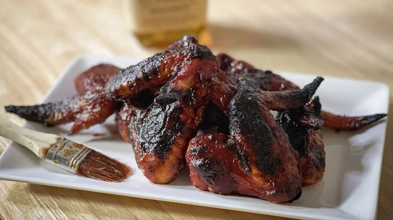 Baked Hot Honey Bourbon Barbecue Chicken Wings on white plate