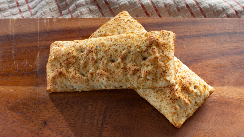 Hot Pockets on cutting board