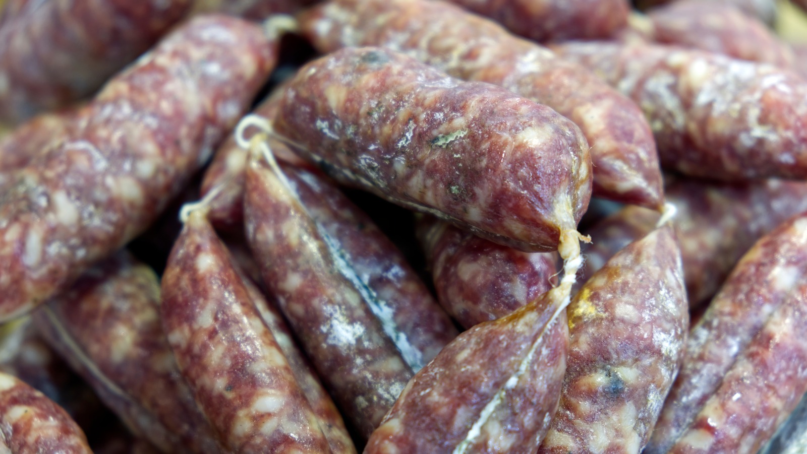 Hot Water Is The Secret To Easily Remove The Casing On Cured Sausage