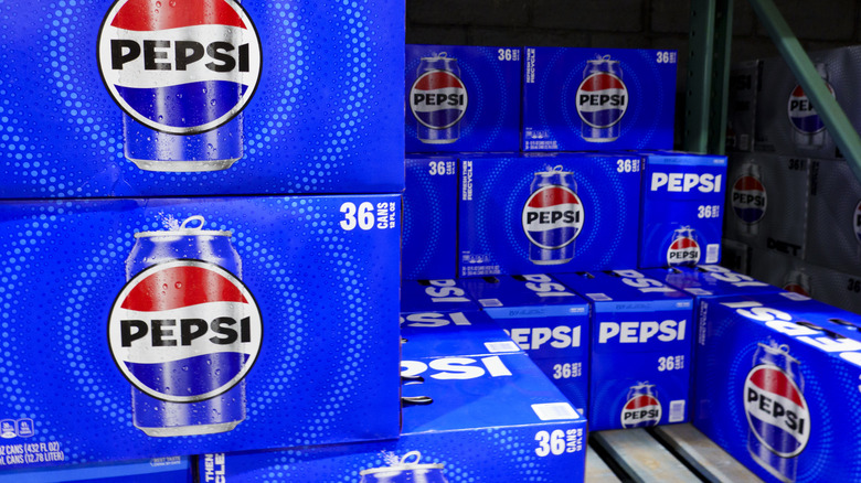 36-can blue cases of Pepsi stacked in a pallet
