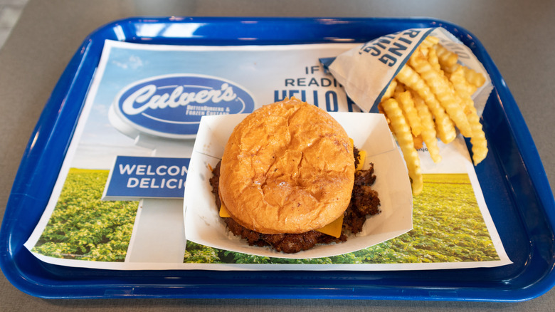 A burger with fries served on Culver's tray