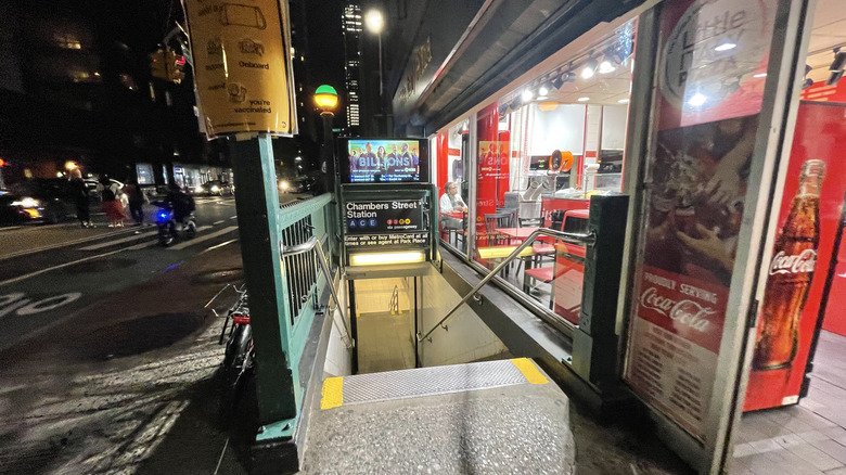Pizza shop and subway entrance in Manhattan's Lower East Side