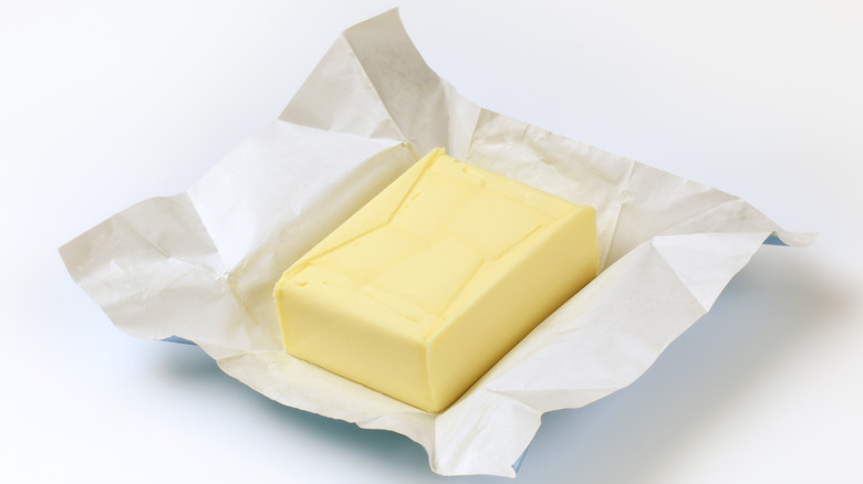 How A Stick Of Butter Can Help You Easily Cut Through Sticky Cheeses