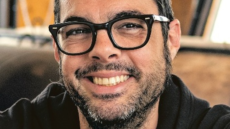 Aaron Franklin smiles with glasses