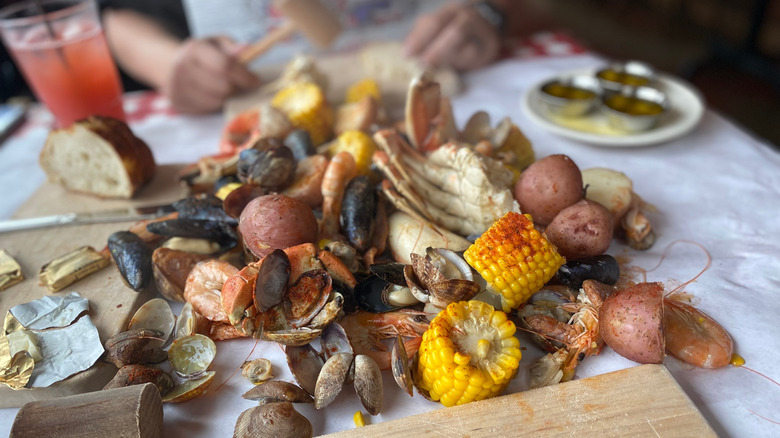 Table topped with seafood boil