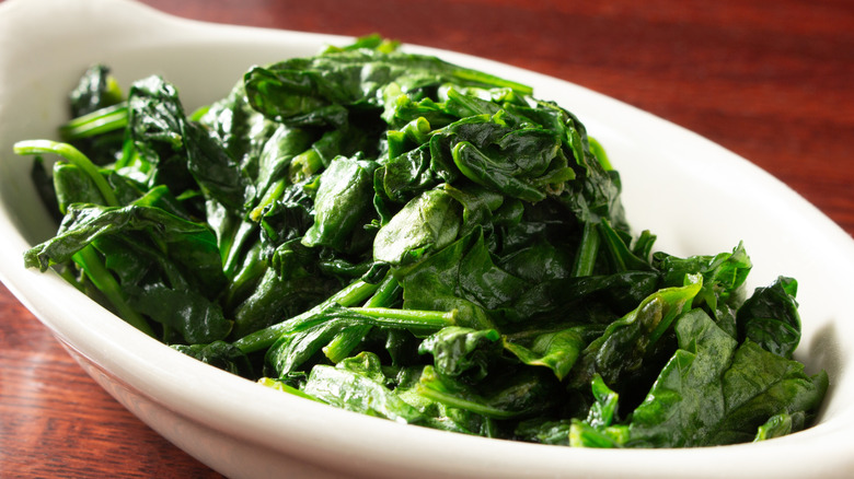 A bowl of wilted spinach