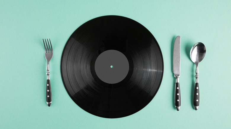 vinyl record with cutlery around