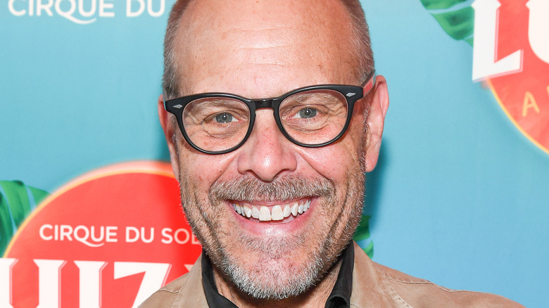 Alton Brown smiling at event 